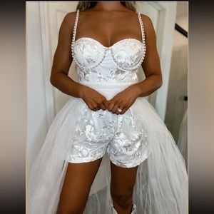 NWT from the boutique Punchy Blonde. Wedding romper in a size Large!